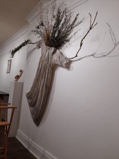 She Moves Between Worlds